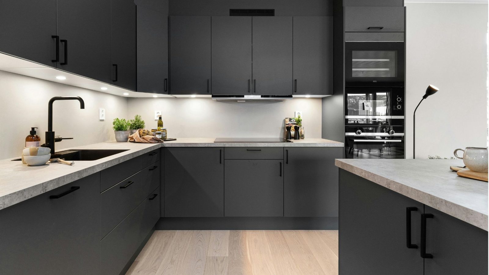 Modern handleless dark grey kitchen