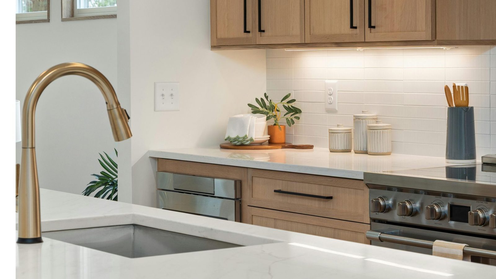 Close-up of a fitted kitchen worktop and tap